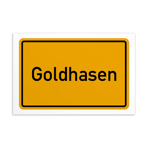 Ein Schild mit der Aufschrift „Goldhasen-Postkarte“ in Gelb und Weiß.