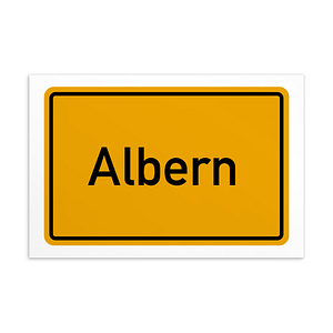 Gelbes Verkehrsschild mit der Aufschrift Albern-Postkarte.
