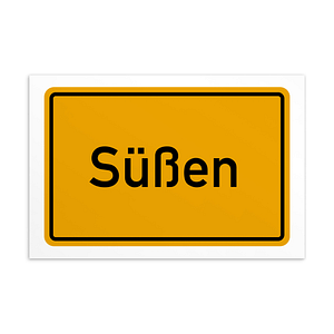 Ein Schild mit dem Wort Süßen-Postkarte in Gelb und Schwarz.