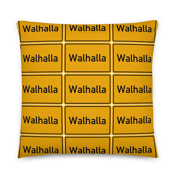 Ein gelber Basic-Kissen mit dem Wort Walhalla.