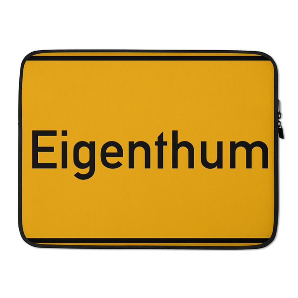 Eine gelbe Laptophülle mit dem Wort Eigenthum darauf.