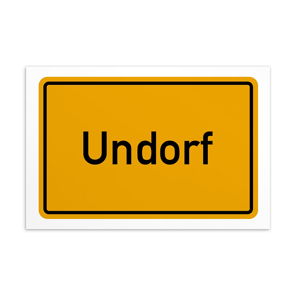Ein Schild mit der Bezeichnung „Undorf-Postkarte“ in gelb-schwarzer Farbgebung.