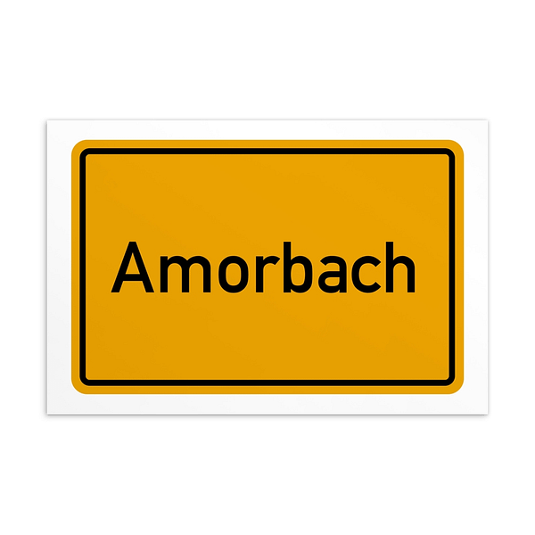 Ein Schild mit der Aufschrift „Amorbach-Postkarte“ in Gelb.
