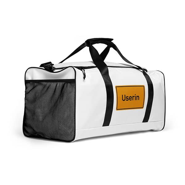 Eine weiße Reisetasche mit der Aufschrift „Userin Reisetasche“.